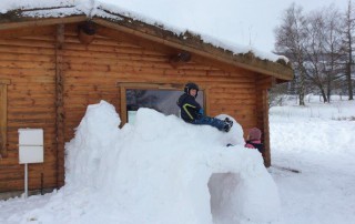 Snow Fun at the Log Cabins